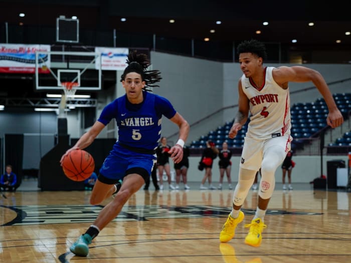 Kyran Tilley, left, threw down a highlight-reel alley-oop dunk last week for Evangel Christian (Kentucky).
